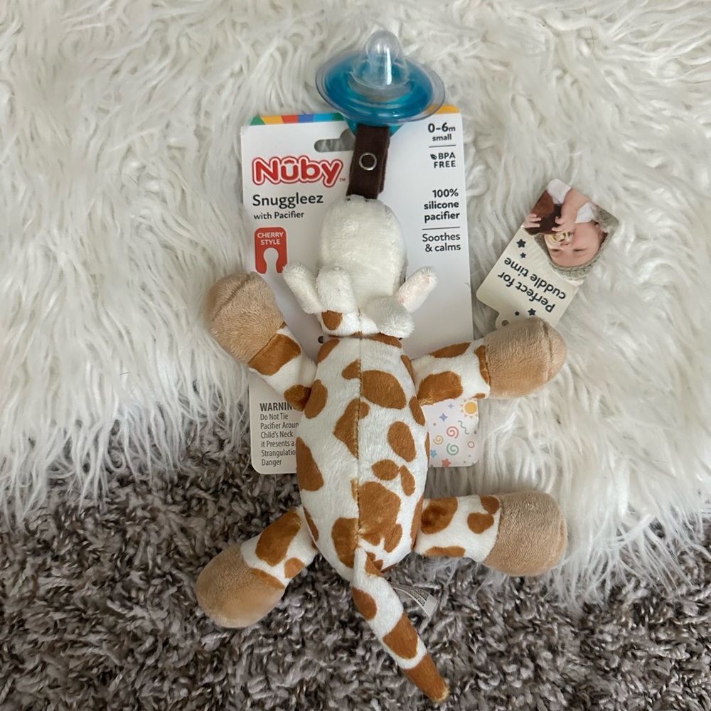 Nuby paci holder. Brand new!
